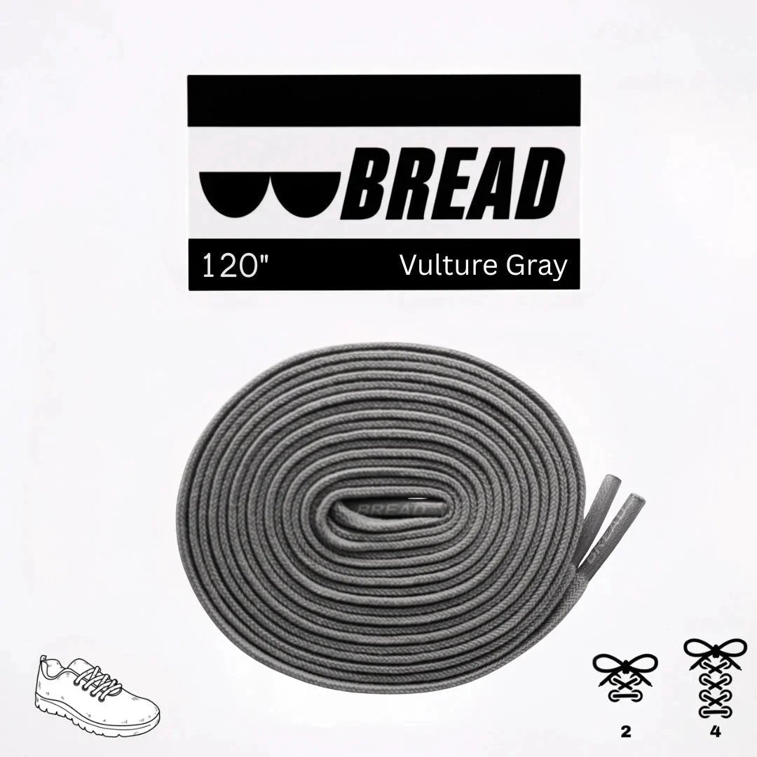 Gray shoelaces with 'BREAD' branding on a white background