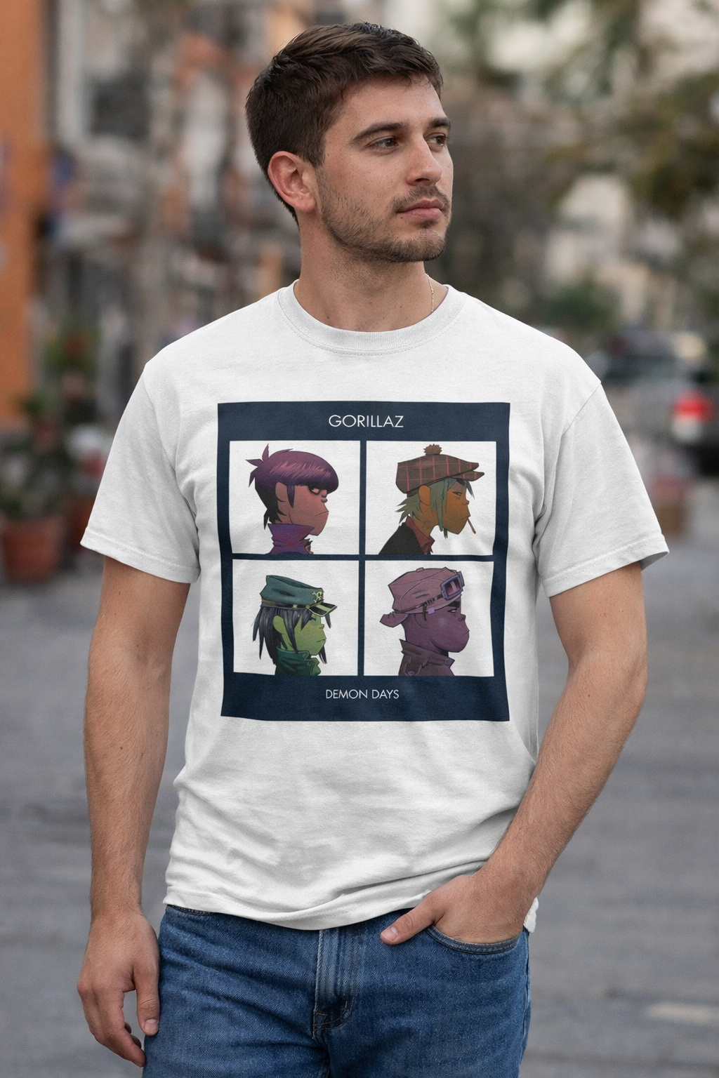 Male model wearing Gorillaz Demon Days t shirt with iconic album artwork in casual streetwear outfit