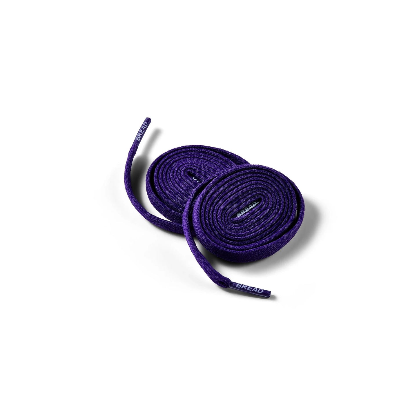 Purple shoelaces on a white background