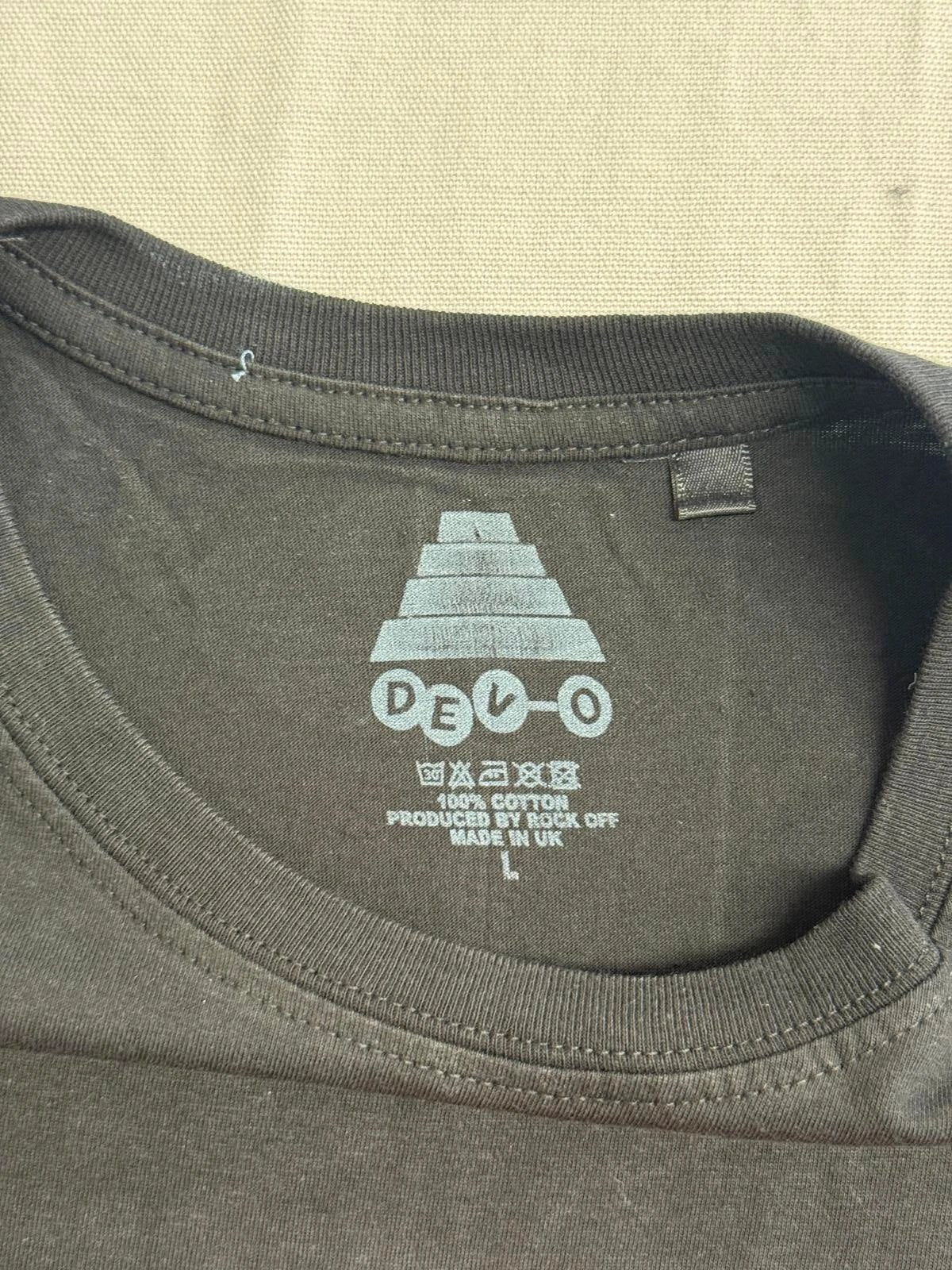 Devo Energy Dome Hat T-shirt featuring the iconic red dome graphic, European import tee.