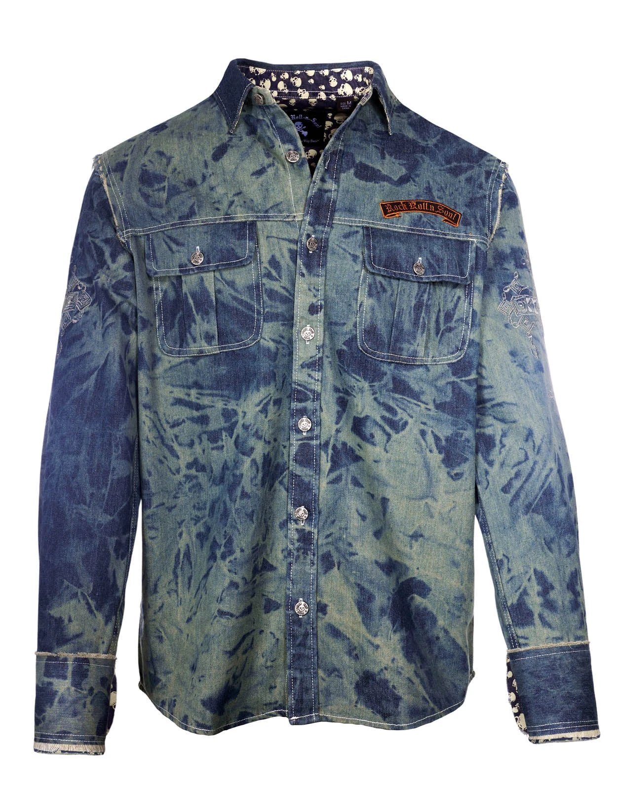 Close-up of Veneno skull denim jacket front showing silver metal skull buttons and distressed vintage wash cotton