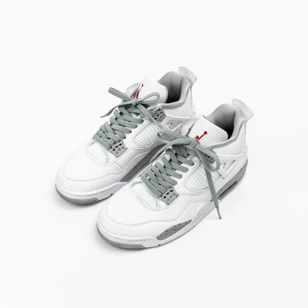 White sneakers with gray accents on a white background