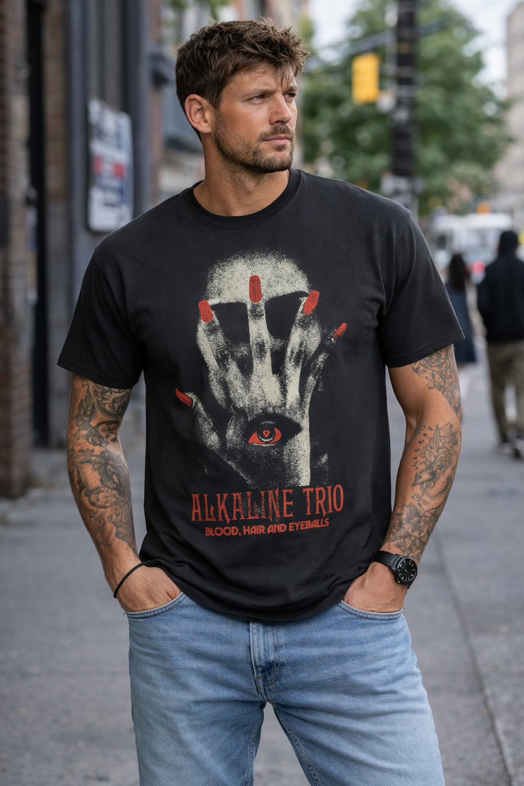 male model wearing Alkaline Trio BHE 4Hand black t shirt with eyeball hand graphic streetwear style