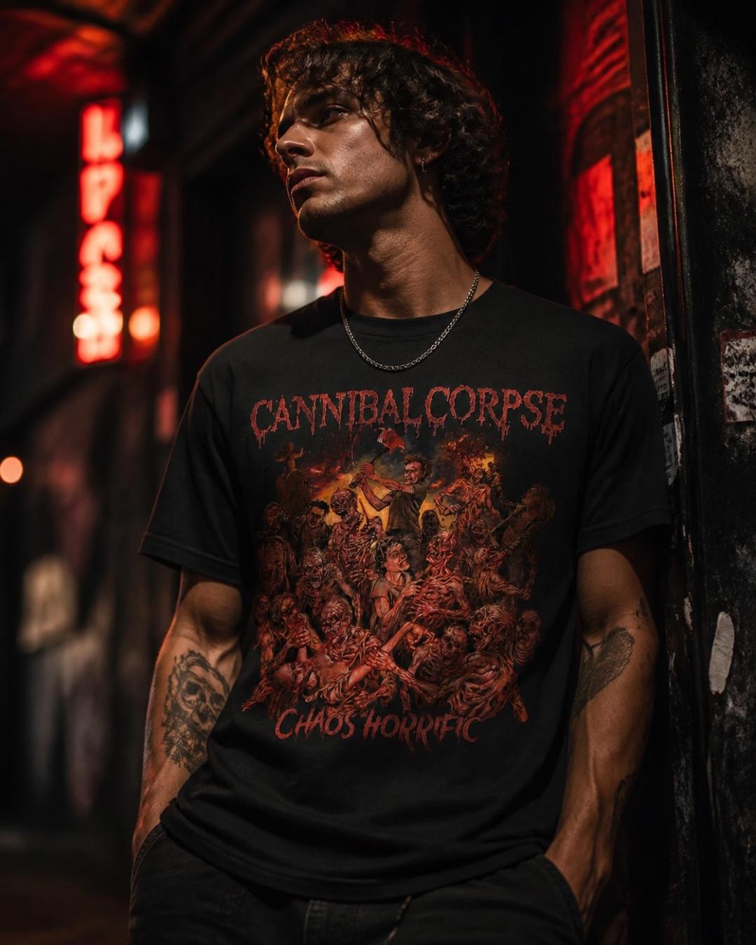 Male model wearing Cannibal Corpse Chaos Horrific black graphic t-shirt in dark urban nightlife setting with alternative metal style
