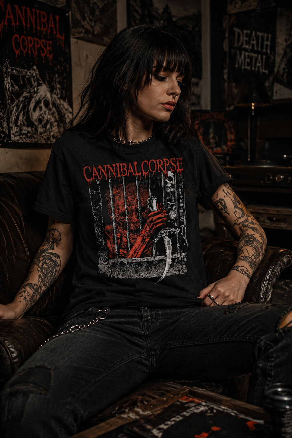 Female metal fan wearing Cannibal Corpse Kill Cell graphic t-shirt in dark rock music room with gothic metal aesthetic