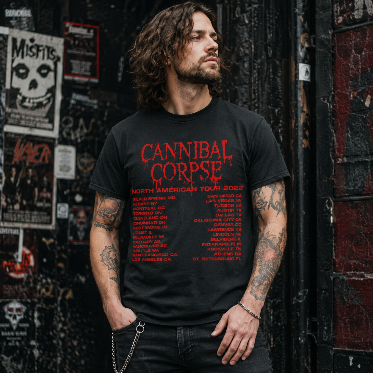 Male model wearing Cannibal Corpse North American Tour 2022 black t-shirt in gritty urban metal concert streetwear setting