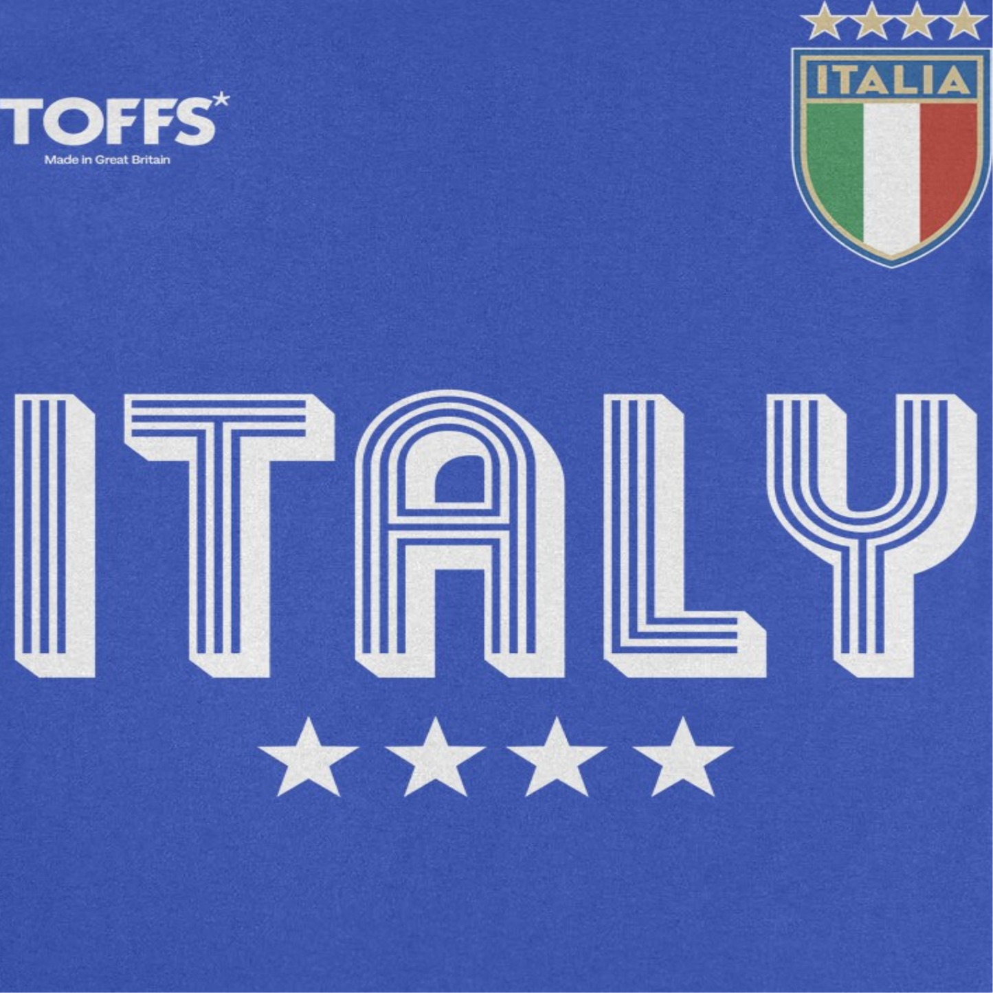 Close-up of Italy royal blue retro soccer t-shirt graphic with crest-style futbol artwork