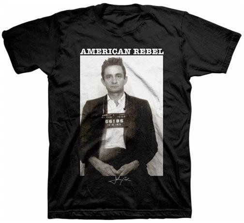 Black t-shirt with a graphic of a man in a suit and 'American Rebel' text on a white background