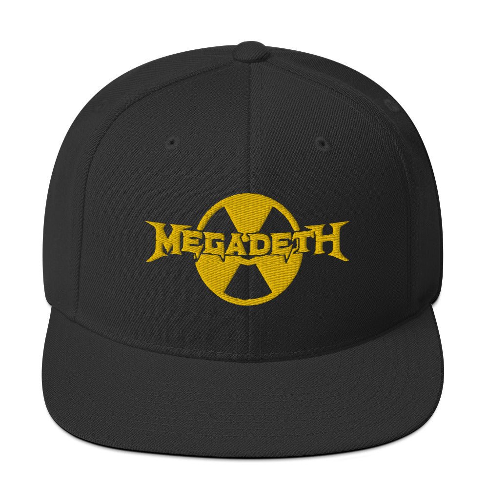Official Megadeth logo snapback hat featuring yellow embroidered logo on a black adjustable cap.