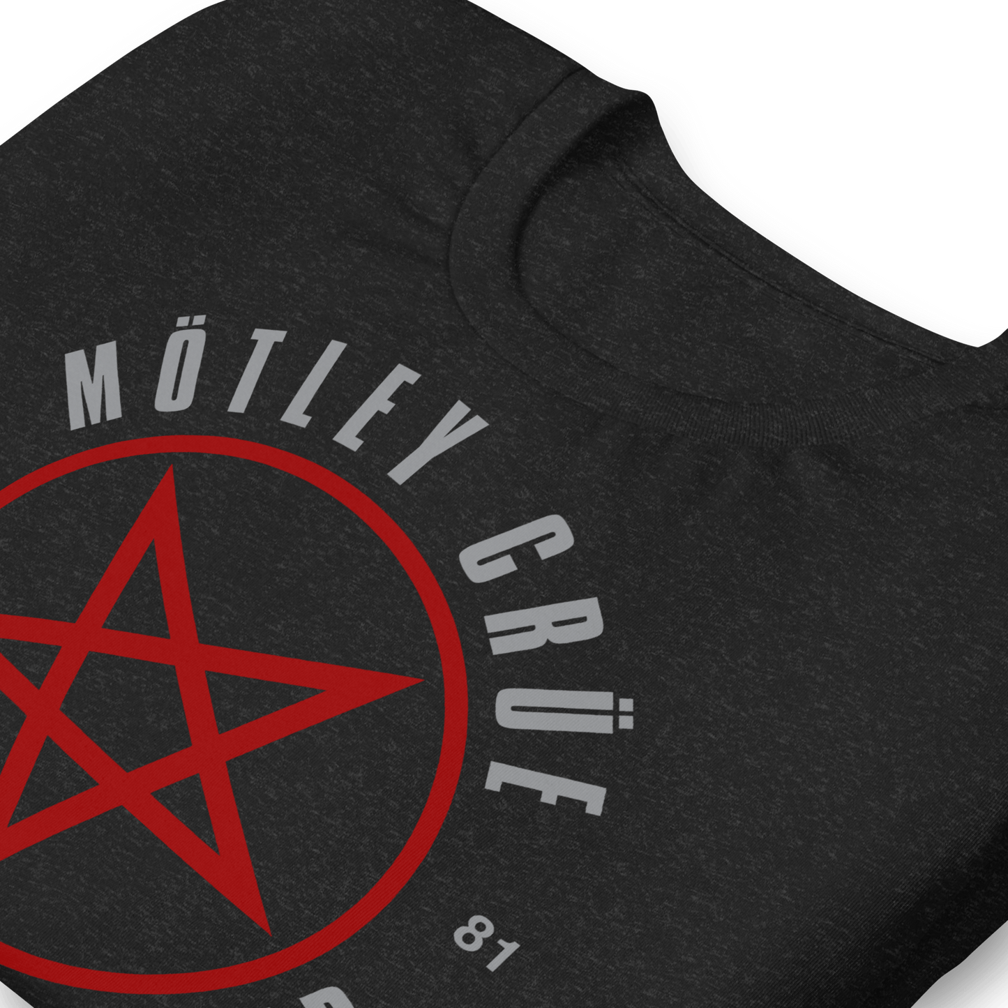 Close-up of the Official Motley Crüe The World Tour T-Shirt featuring the red pentagram graphic, Est. 81 design, and premium eco-friendly print on heavyweight black 100% cotton fabric.