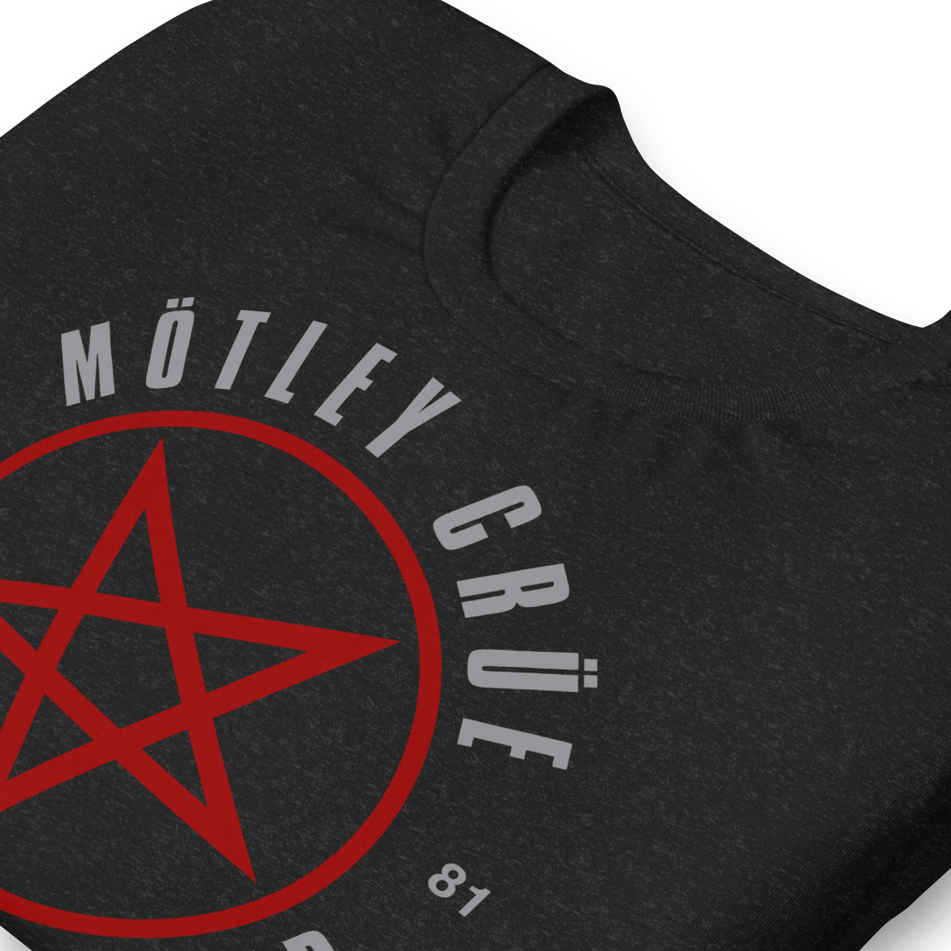 Close-up of the Official Motley Crüe The World Tour T-Shirt featuring the red pentagram graphic, Est. 81 design, and premium eco-friendly print on heavyweight black 100% cotton fabric.