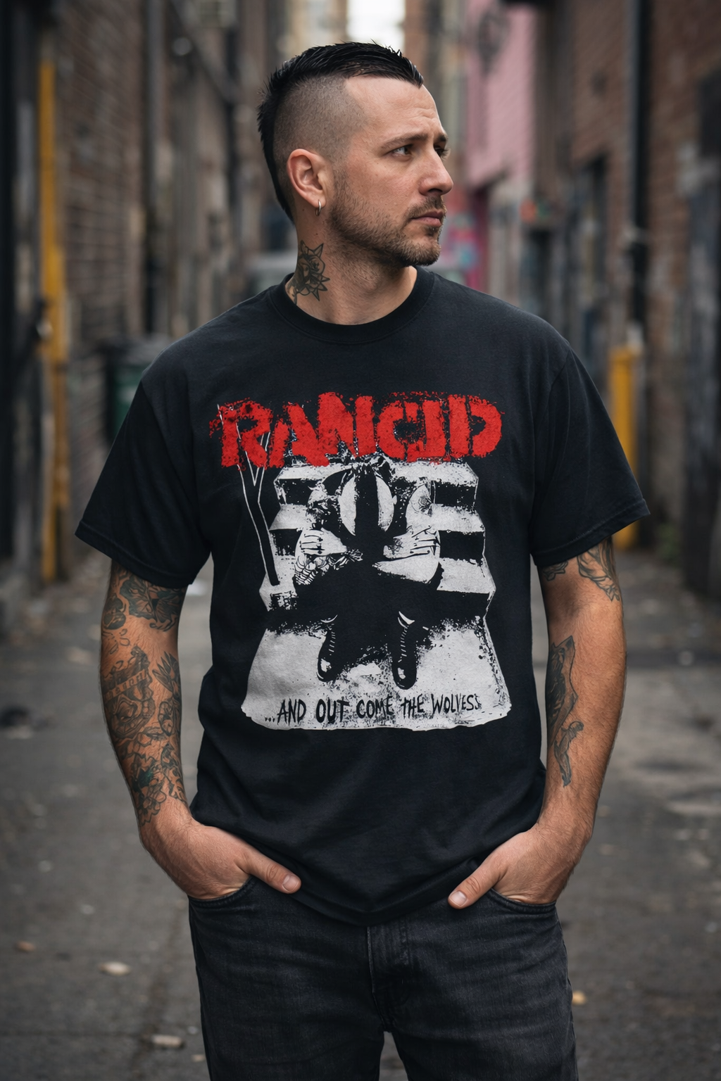 male model wearing Rancid And Out Come the Wolves t shirt in urban street setting punk band merch