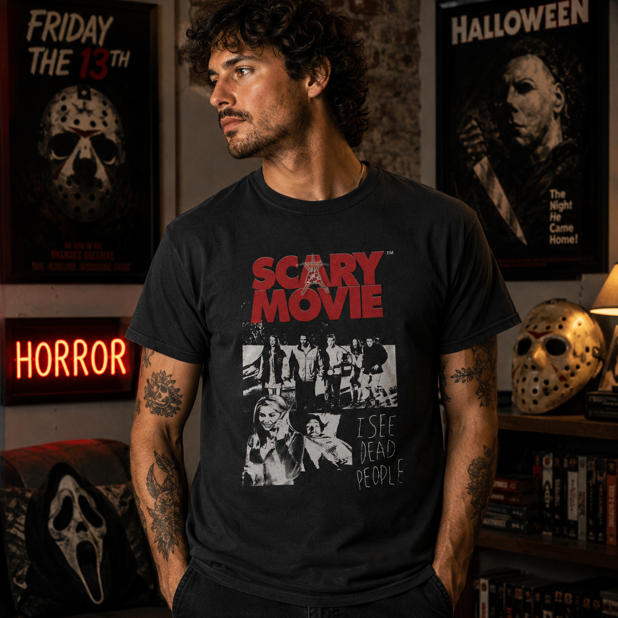 Male model wearing Scary Movie I See Dead People Black T-Shirt in horror movie room setting