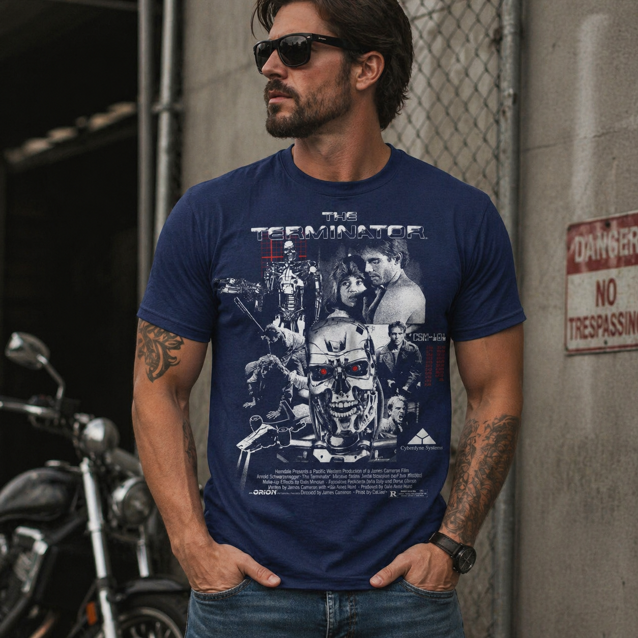 Male model wearing Terminator collage t shirt featuring T-800 and Cyberdyne design in urban setting