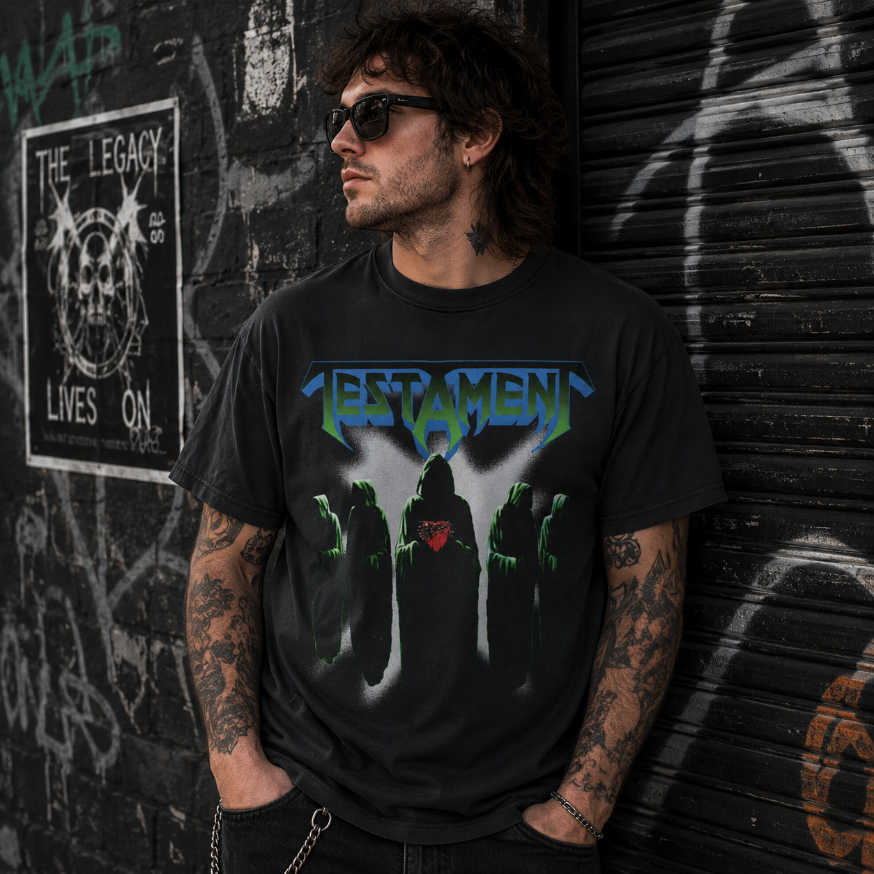 Male model wearing officially licensed Testament Dark Figures thrash metal band t-shirt in an urban graffiti alley with heavy metal streetwear style.