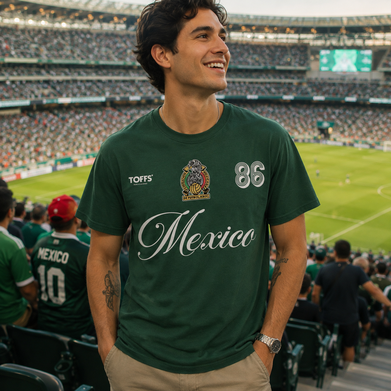 Male model wearing Toffs Retro Soccer Mexico Green T-Shirt at a soccer stadium